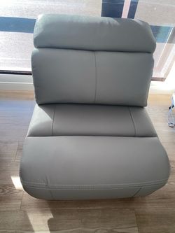 Light grey armless chair