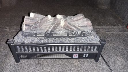 space heater. and lights up fake flame $150 new aaking$75