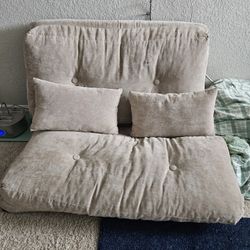 Beige Twin Sized Floor Couch