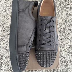 Christian Louboutin , Red bottoms