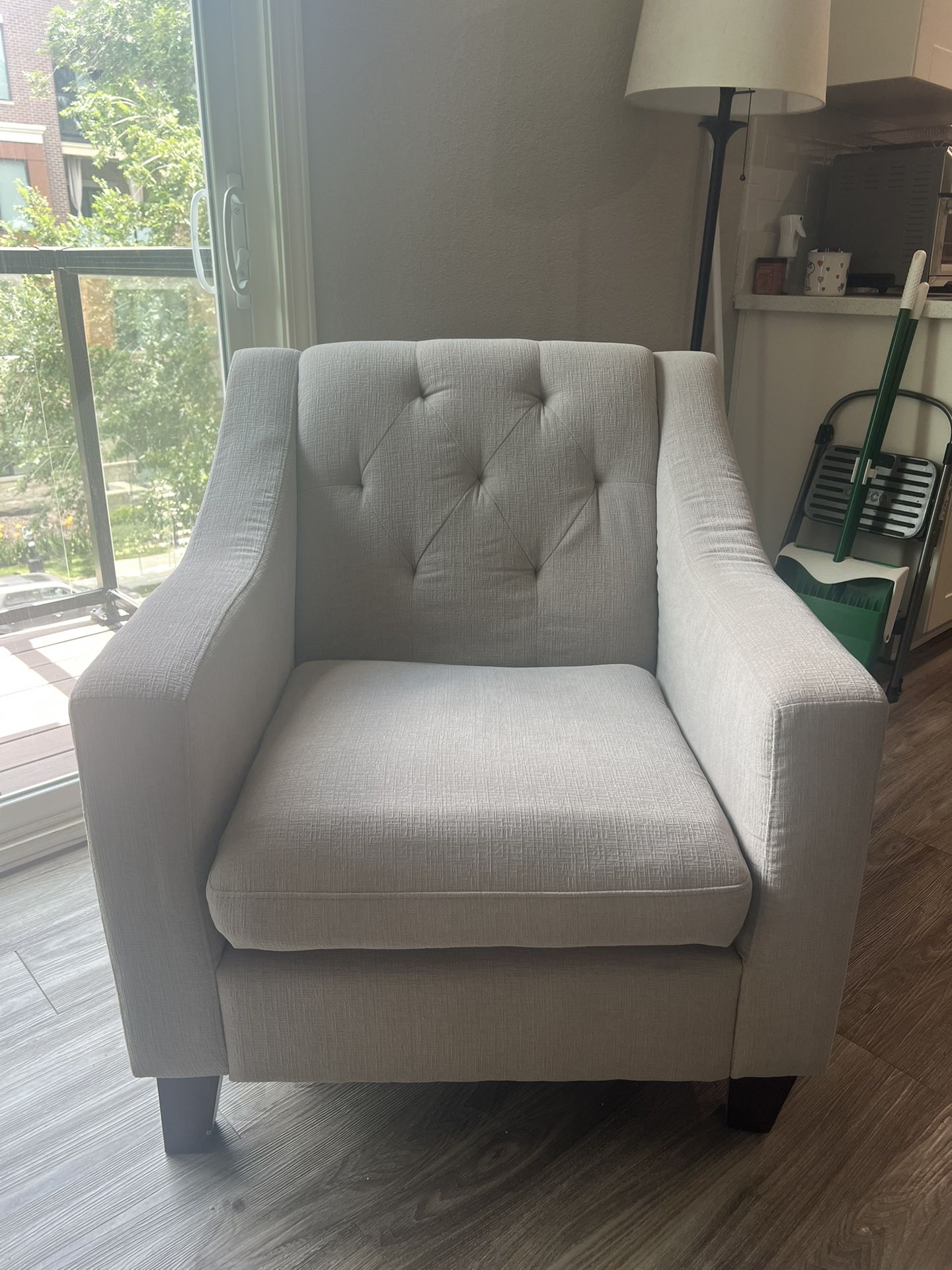Light Beige Tufted Armchair with Sloped Arms & Tufted Back