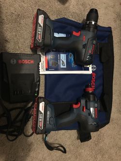 Bosch 18v 2 tool combo kit ( 1/2 inch hammer drill and 1/4 inch impact driver/ wrench two battery charger and bag . brand new