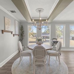 Dining Table With Four Chairs And Rug 