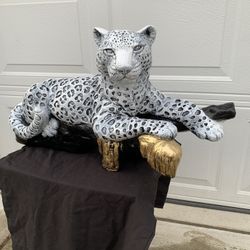 Painted Leopard On The Log Statue