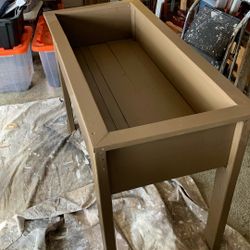 Planter..Raised pine planter.42 Inches By 18 Inches. 3 Coats Exterior paint.  Height Is 30 Inches.  