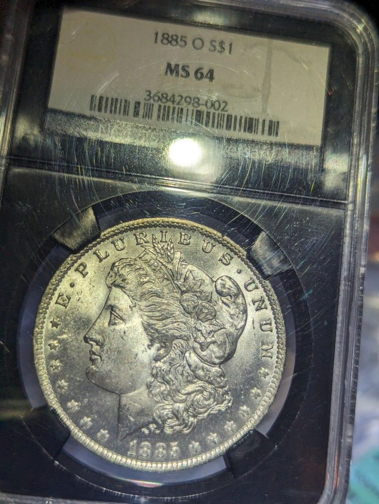 1885 O Morgon Silver Dollar NGCMS64
