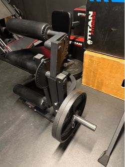 Titan Fitness seated leg curl/ext combo machine