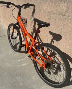 Giant XtC Jr 24 Lite youth mountain bike in vibrant orange