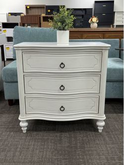 Traditional 3-Drawer End Table with Built-in Charging Station and Solid Wood Spindle Legs.  There are some minor imperfections, but they don’t affect 