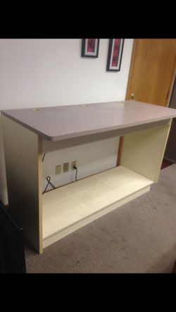 Two tables. Measurements arje 30"x67". Each table has attached outlet with cord. Can assemble and de-assemble.