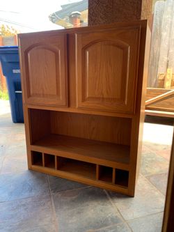 3 wood cabinets