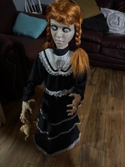 Scary electronic doll and inflatable chicken costume