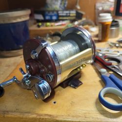 Penn Reel With Tiburon Brass Frame