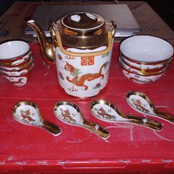 Vintage Dragon and Phoenix Decorated Gilt Teapot With Bowls And Spoons