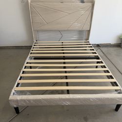 Bed frame full size with charging station .