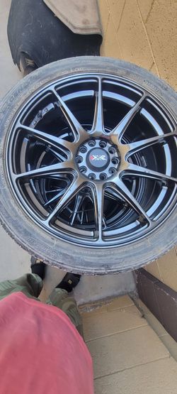 Nice set of rims w/tires 80%good 245/40ZR18. 5 lugs universal