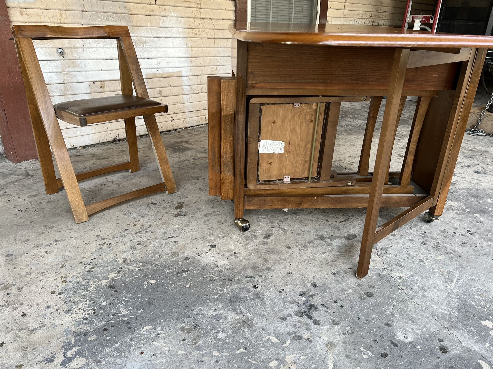 Mid century Walnut Gateleg Dining Table with Hideaway Chairs