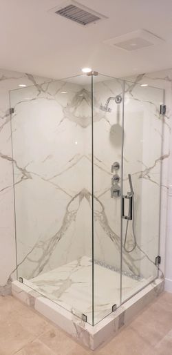 Beautiful corner glass shower door.