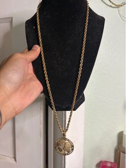 Gold 14kt Rope chain World is yours Pendant