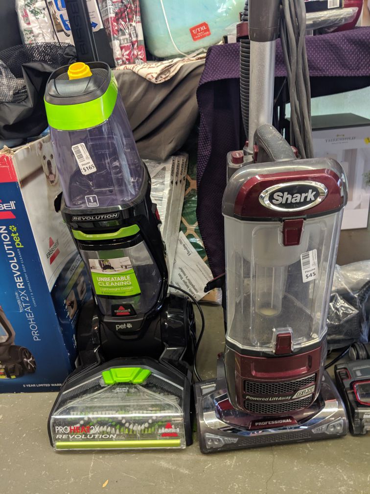 Ridiculous deals on Shark vacuums! As well as Bissell carpet steamers