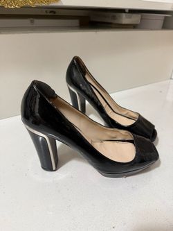 - Prada Prada Black Patent Peep-Toe Heels. Chic and very comfy, perfect for wider feet