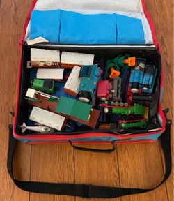 Thomas, the Tank carrying case filled with trains and tracks and a little thermos thrown in
