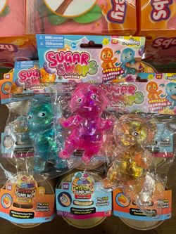 100% Original Orb Sugar Swap Baby Onesie Glitter Squishy $15 EACH