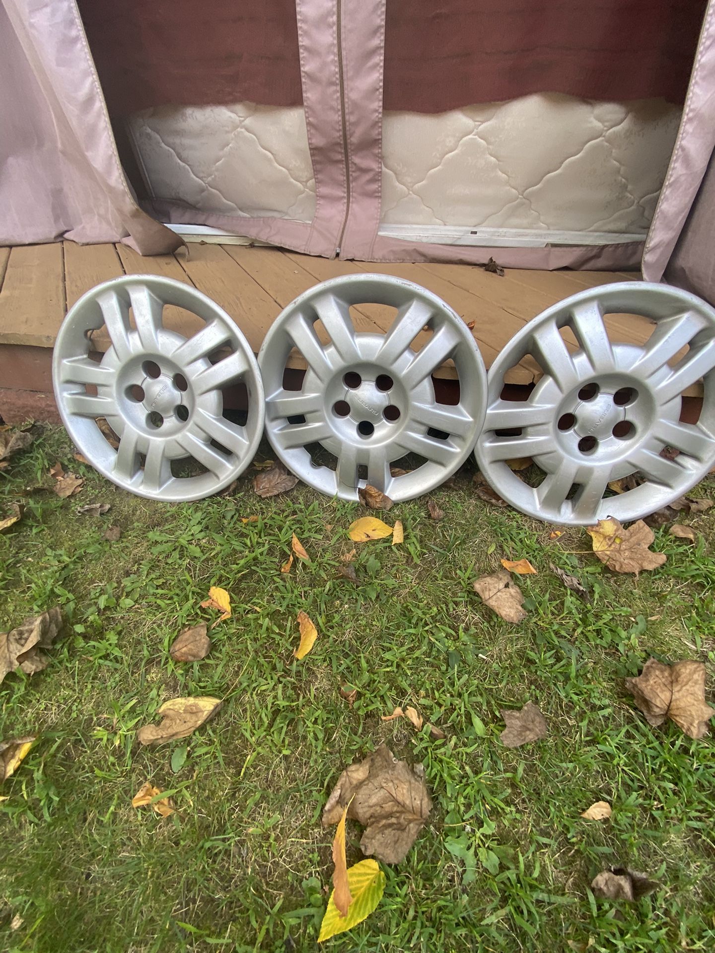 Subaru Impreza Three hubcaps older model 2000 To 2007 any 16 inch