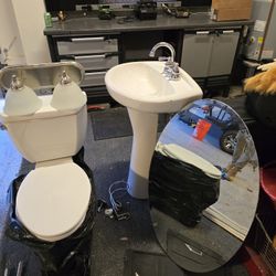 Toilet Pedestal Mirror Foucet Light Fixtures And Some Hangers 