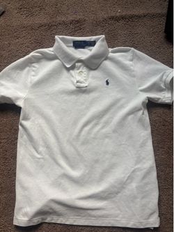 Polo Ralph Lauren shirt size xl big kids but it could fit a size small in men.