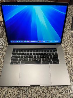 2019 Apple MacBook Pro 15-inch Retina Display Touch Bar  2.6ghz 6-core i7 processor. 16 gb RAM500gb ssd