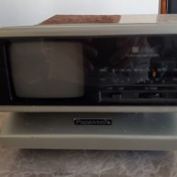 Panasonic Tv/FM-AM Radio Clock BI sider