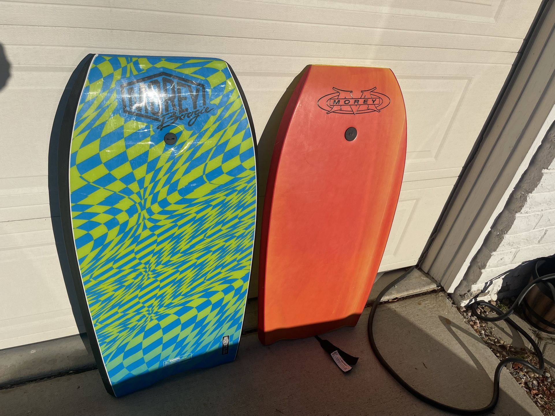 Orange/yellow Morey Boogie Boards $15   Blue is sold