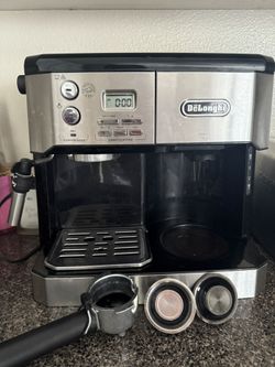 Delonghi all in one coffee machine in espresso, perfect working condition, all parts are there, missing the coffee mug (you can buy new for $20 from o