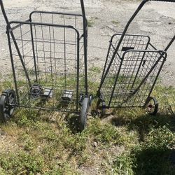 Two foldable shopping carts with wheels
