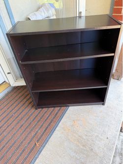 BOOKCASE 29"w x 11 1/2"d x 37 1/2"high; cross streets are Arapaho & Waterview