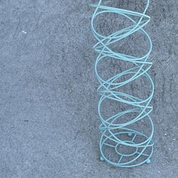 Seafoam green metal toilet paper holder