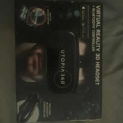 Virtual reality 3D headset with Bluetooth controller.