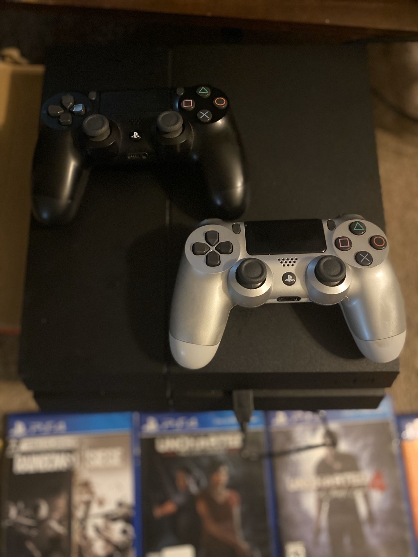 PS4 with 9 GAMES 2 CONTROLLERS!