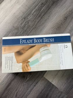 $5.00 , new. Epilady body brush with 4 heads,