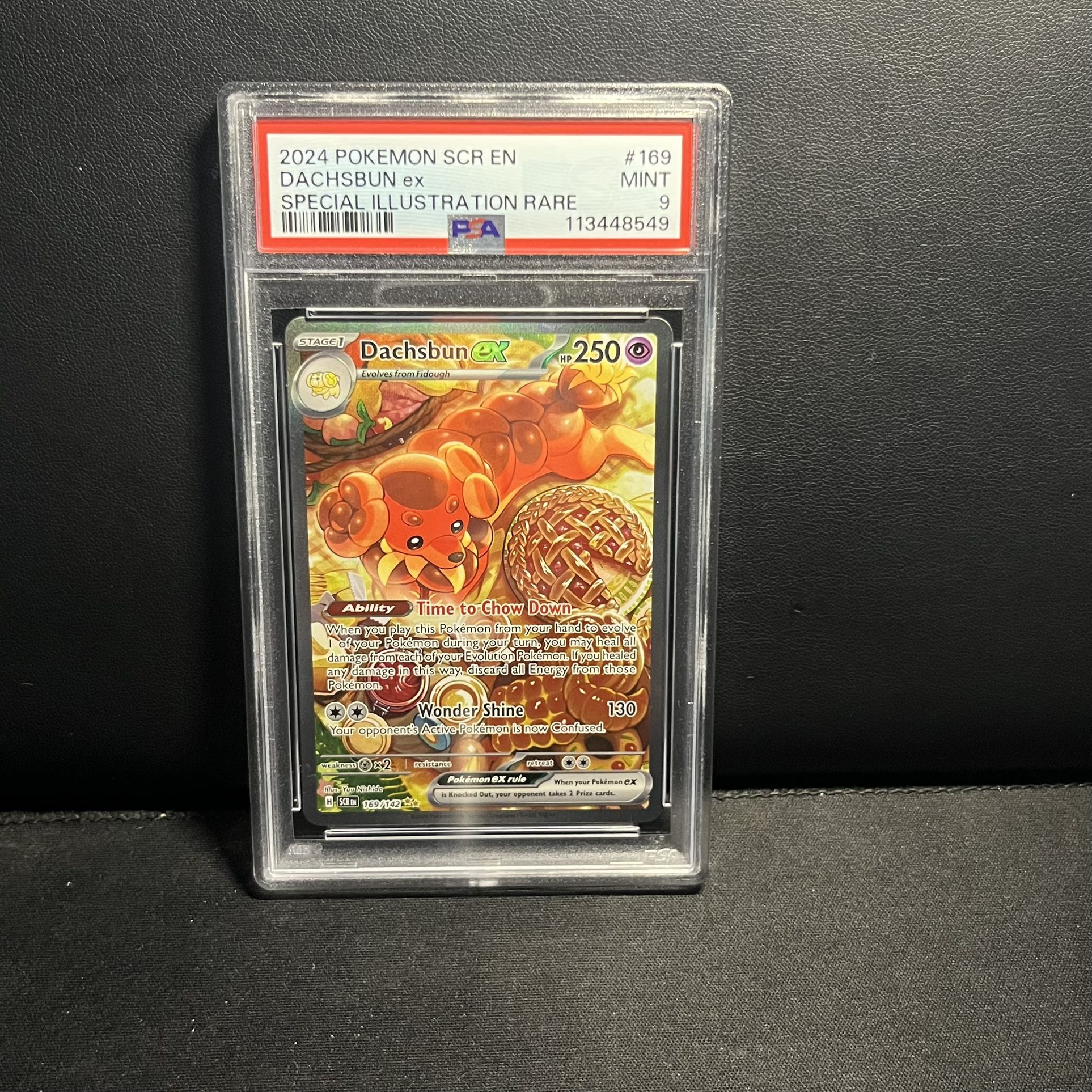 Dachsbun ex 169/142 Sv07: Stellar Crown Holo PSA 9 Scarlet And Violet