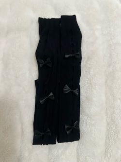 black Lolita-style fishnet tights with vertical cut-outs & satin bow accents ⋆. 𐙚 ˚