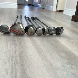 Multiple Mixed Golf Clubs