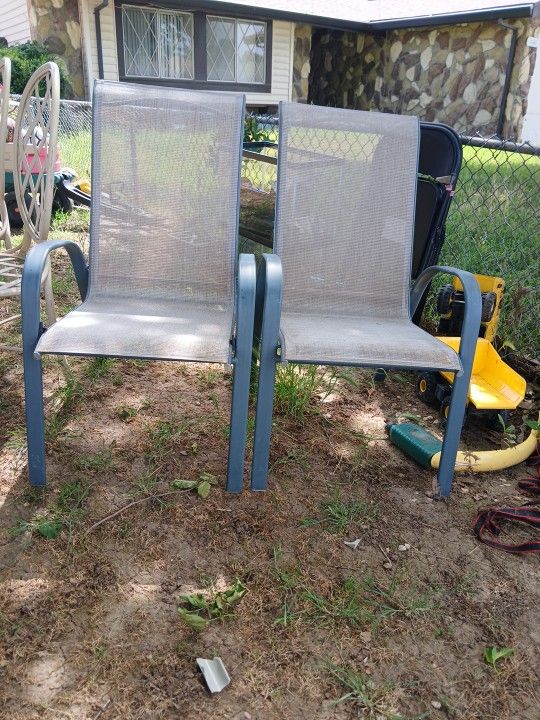 Pair Of Grey Metal Stacking Sling Patio Arm Chairs