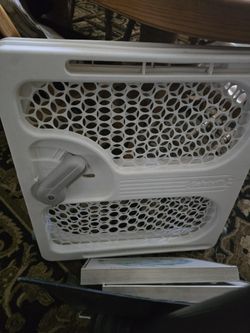 White plastic  protective gate