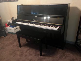 $50! Beautiful, black lacquer upright piano
