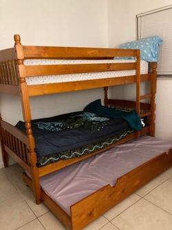 NEW TWIN OVER TWIN WITH TRUNDLE BWD AND NEW MATTRESS INCLUDED