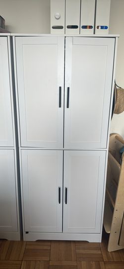 70” white pantry/storage cabinet