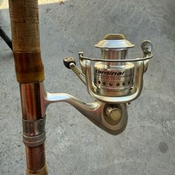 Abu Garcia Cardinal 104 spinner on 6’5” custom rod #34