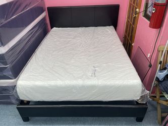 Black Faux leather Queen size bed frame, and 12”Memory Foam Mattress, in Excellent Condition, Mattress Are Sanitized And Sealed In Plastic,